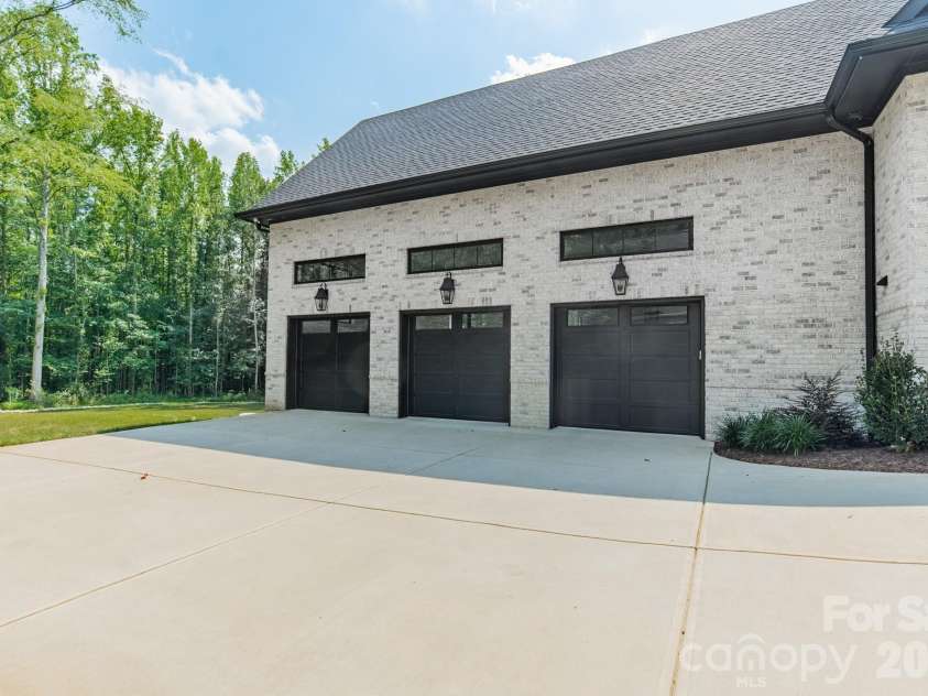 1725 Turtlewood Drive, Waxhaw, NC 28173.  MLS# CAR4407986, YatesRealty ID 45919. Oversized 3-Car Garage