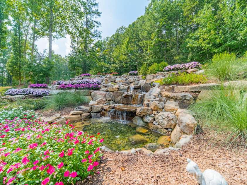 1725 Turtlewood Drive, Waxhaw, NC 28173.  MLS# CAR4407986, YatesRealty ID 45919. Seven-Waterfall Rock Feature