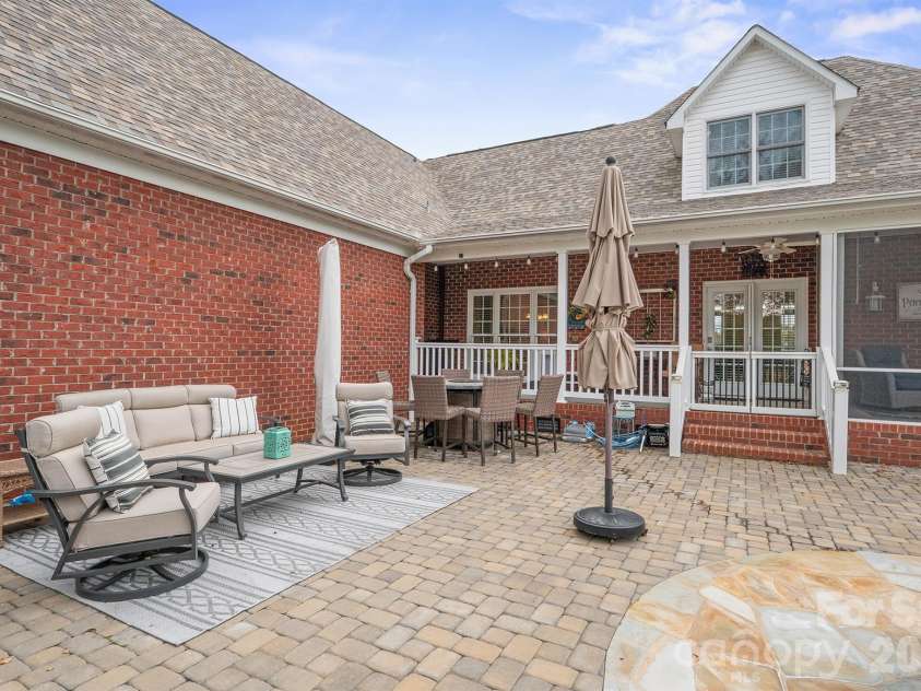 277 Glenwood Drive, Oakboro, NC 28129.  MLS# CAR4312178, YatesRealty ID 45923. Private back porch, partial screened in area