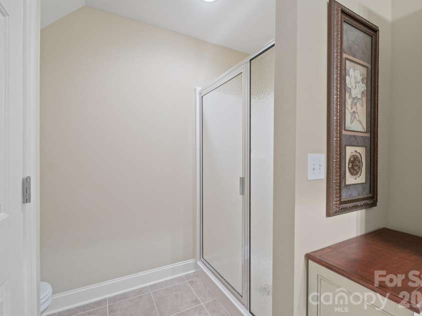 277 Glenwood Drive, Oakboro, NC 28129.  MLS# CAR4312178, YatesRealty ID 45923. Upstairs step in shower