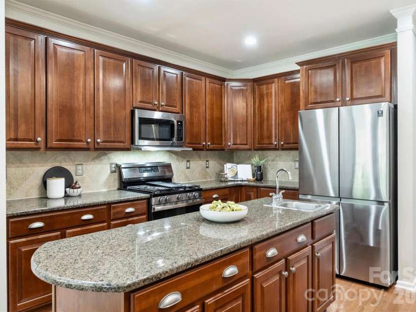 1136 Aringill Lane, Matthews, NC 28104.  MLS# CAR4415913, YatesRealty ID 45924. 