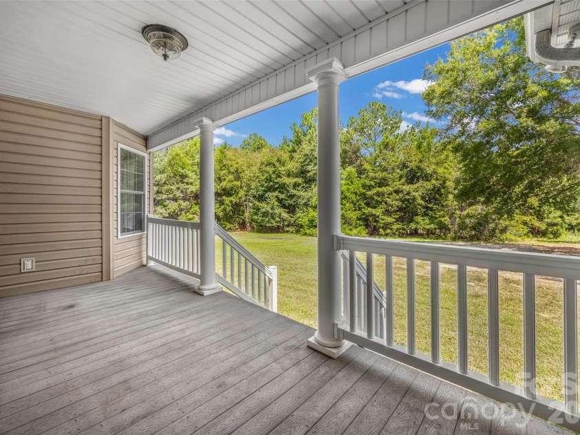 2229 Starnes Road, Edgemoor, SC 29712.  MLS# CAR4409854, YatesRealty ID 45934. Back porch