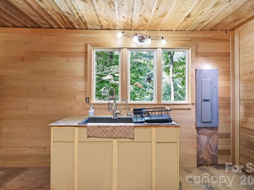 464 Mason Road, Ellenboro, NC 28040.  MLS# CAR4413857, YatesRealty ID 45942. Water filter on kitchen sink
