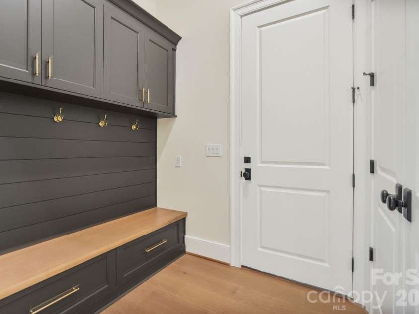 21216 Rio Oro Drive, Cornelius, NC 28031.  MLS# CAR4425303, YatesRealty ID 45943. Thoughtful millwork, tons of storage.