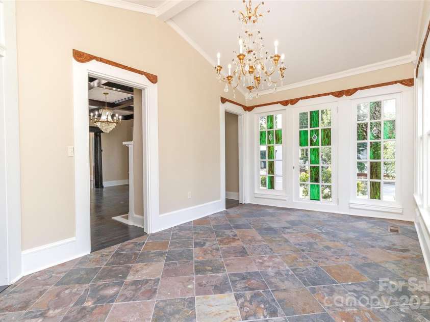 903 Franklin Street, Monroe, NC 28112.  MLS# CAR4290164, YatesRealty ID 45947. Sunroom