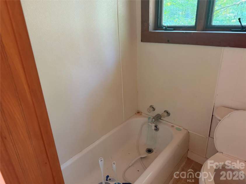 19010 Rosman Highway, Sapphire, NC 28774.  MLS# CAR4416340, YatesRealty ID 45969. 