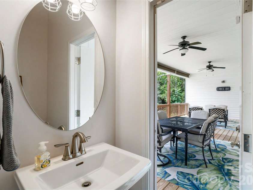 1421 Hamilton Crossroads Road, Marshville, NC 28103.  MLS# CAR4409777, YatesRealty ID 45975. Half Bath access to main level covered deck