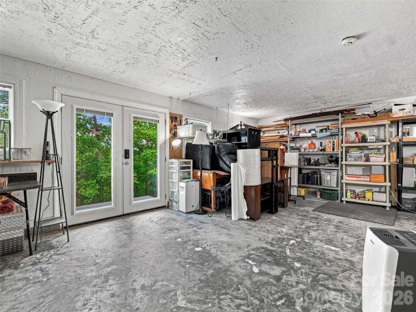 524 Lookout Drive, Pisgah Forest, NC 28768.  MLS# CAR4416154, YatesRealty ID 45993. Basement Flex Space