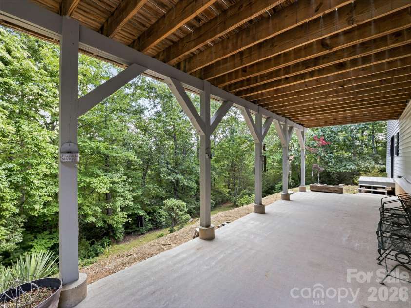 524 Lookout Drive, Pisgah Forest, NC 28768.  MLS# CAR4416154, YatesRealty ID 45993. Basement Patio