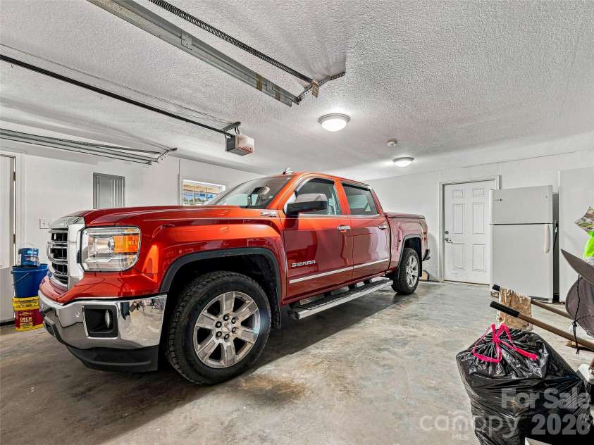 524 Lookout Drive, Pisgah Forest, NC 28768.  MLS# CAR4416154, YatesRealty ID 45993. Garage Bay