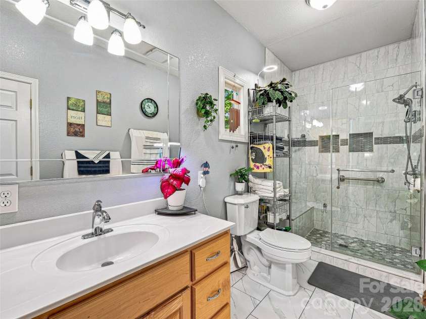 524 Lookout Drive, Pisgah Forest, NC 28768.  MLS# CAR4416154, YatesRealty ID 45993. Primary Bath