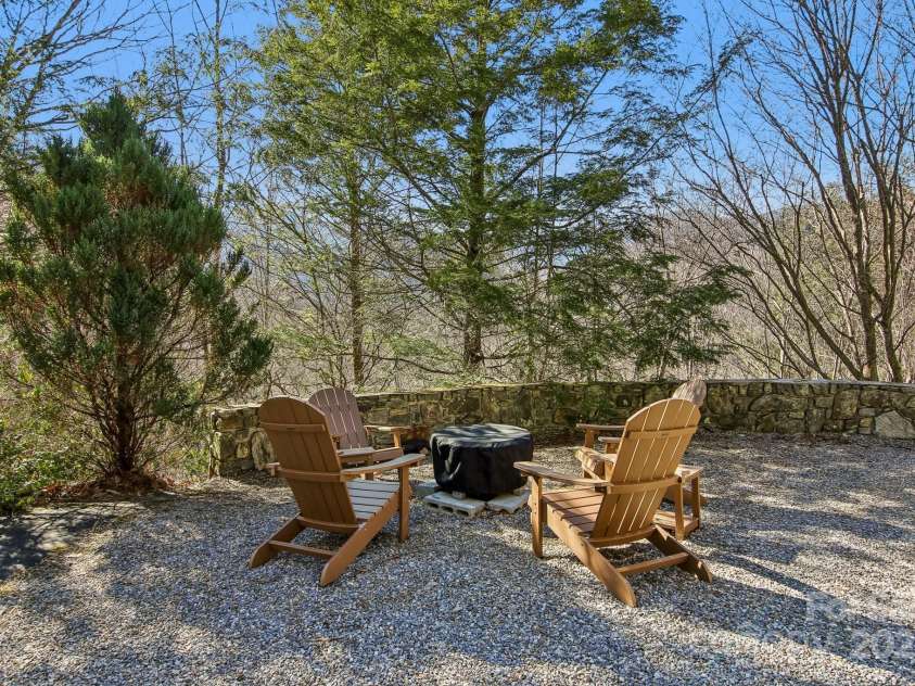 821 Summit Drive, Maggie Valley, NC 28751.  MLS# CAR4225220, YatesRealty ID 4600. Firepit area