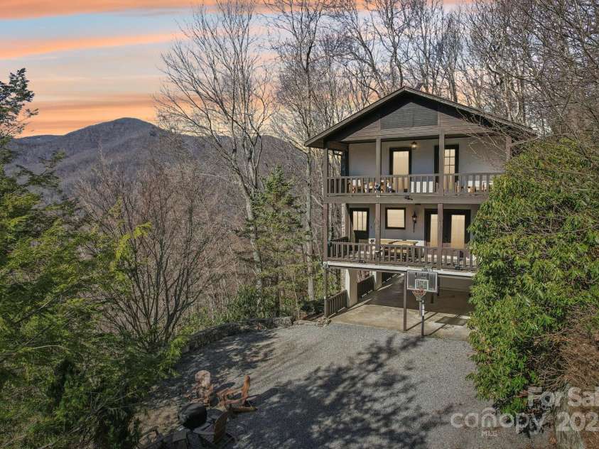 821 Summit Drive, Maggie Valley, NC 28751.  MLS# CAR4225220, YatesRealty ID 4600. Long range mountain views