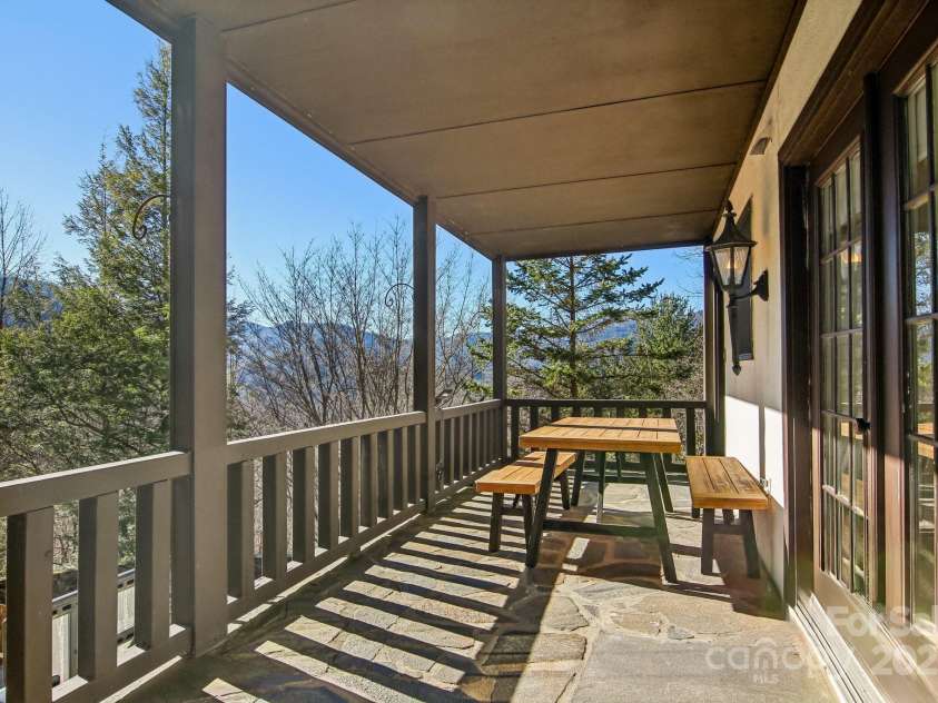 821 Summit Drive, Maggie Valley, NC 28751.  MLS# CAR4225220, YatesRealty ID 4600. Second porch mountain views