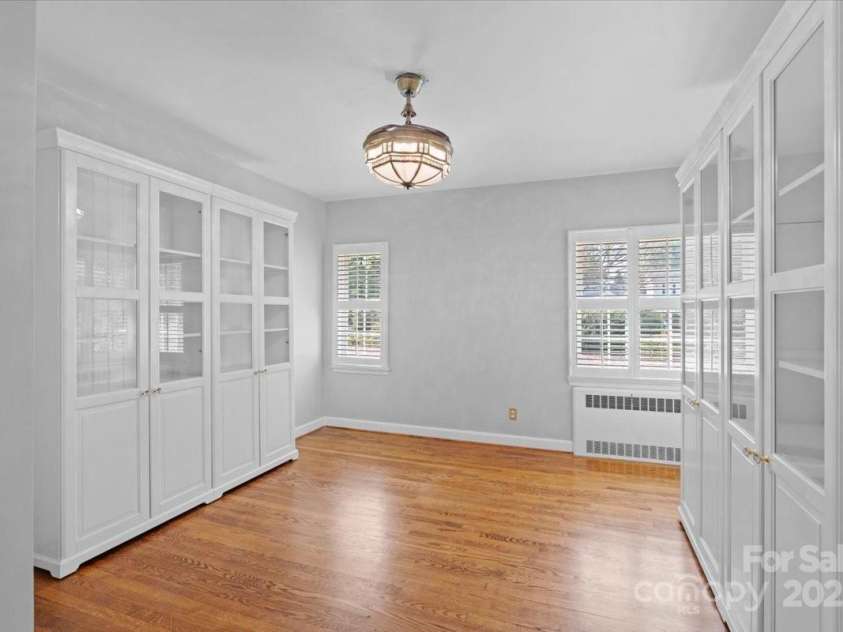 1626 Wendover Road, Charlotte, NC 28211.  MLS# CAR4155569, YatesRealty ID 4601. Bedroom one with built ins and plantation shutters, currently used as an office.