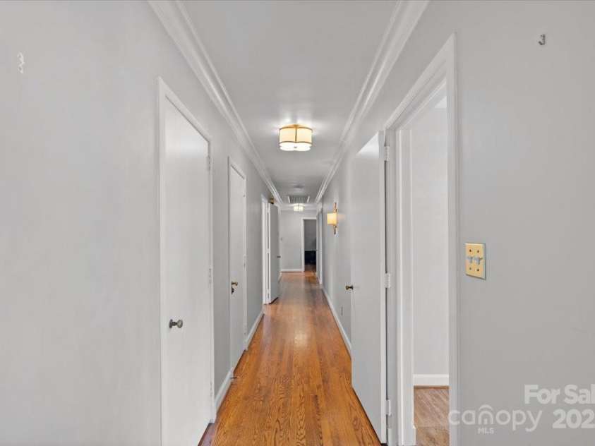 1626 Wendover Road, Charlotte, NC 28211.  MLS# CAR4155569, YatesRealty ID 4601. Hallway leading to the bedrooms.