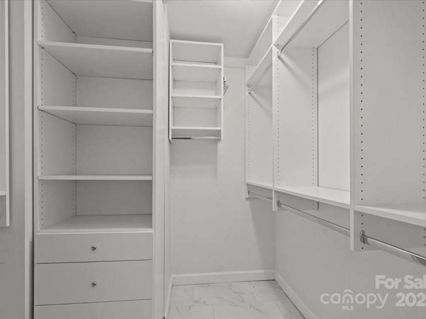 1626 Wendover Road, Charlotte, NC 28211.  MLS# CAR4155569, YatesRealty ID 4601. Primary closet with built in storage.