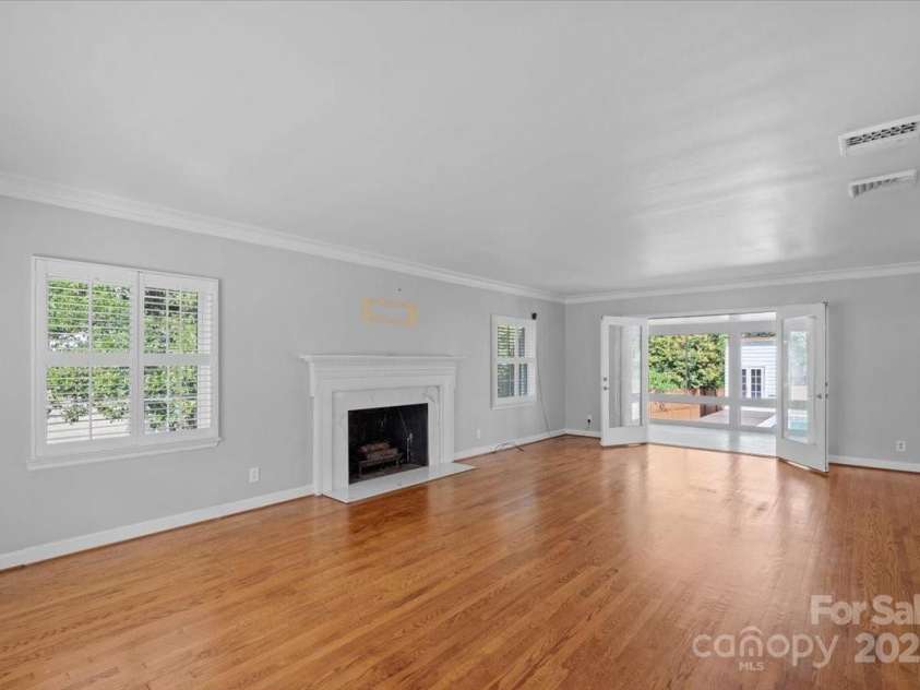 1626 Wendover Road, Charlotte, NC 28211.  MLS# CAR4155569, YatesRealty ID 4601. Tons of natural light and french doors leading to the sunroom.