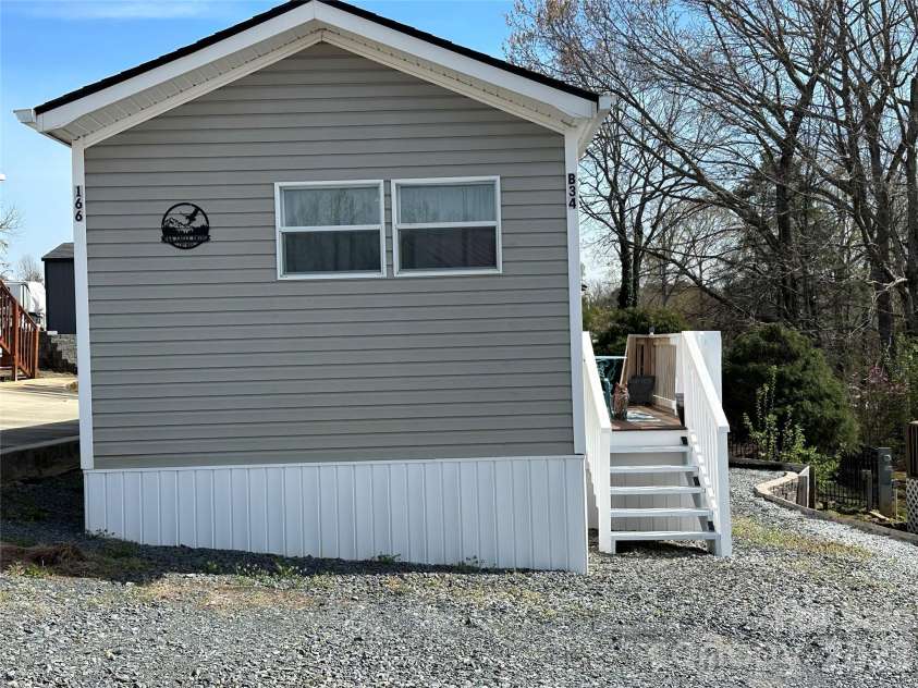 166 Eagle Drive, New London, NC 28127.  MLS# CAR4357990, YatesRealty ID 4603. 