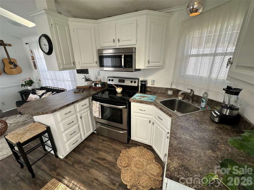 166 Eagle Drive, New London, NC 28127.  MLS# CAR4357990, YatesRealty ID 4603. 