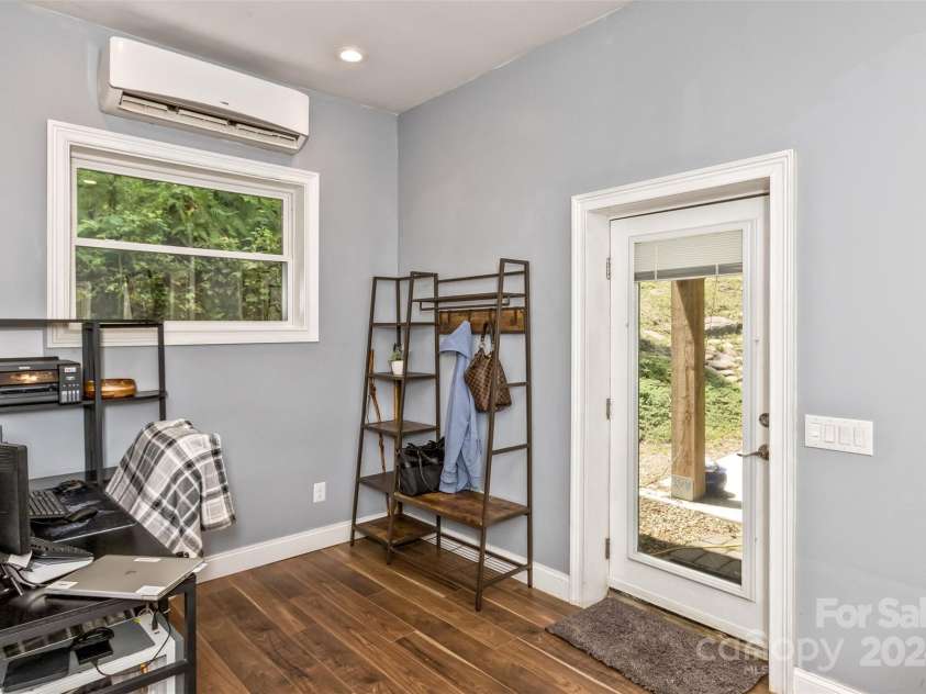 3882 New Leicester Highway, Leicester, NC 28748.  MLS# CAR4168284, YatesRealty ID 4603. Enter from the carport into the mudroom/computer nook