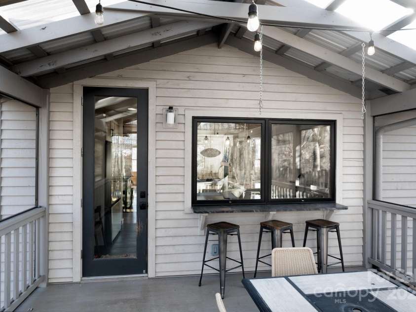 122 and 124 Shelburne Road, Asheville, NC 28806.  MLS# CAR4232938, YatesRealty ID 4604. Designed to Entertain