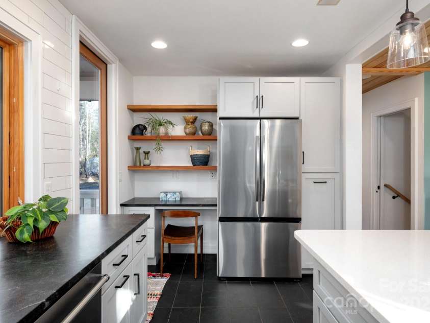 122 and 124 Shelburne Road, Asheville, NC 28806.  MLS# CAR4232938, YatesRealty ID 4604. Gleaming Stainless Steel Appliances and Built-In Desk Nook