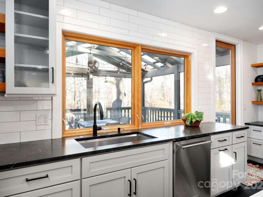 122 and 124 Shelburne Road, Asheville, NC 28806.  MLS# CAR4232938, YatesRealty ID 4604. Pass-Through Window Connects Kitchen and Screened Porch