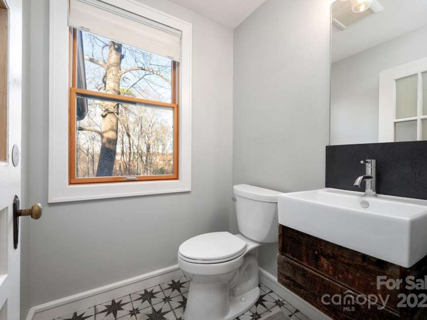 122 and 124 Shelburne Road, Asheville, NC 28806.  MLS# CAR4232938, YatesRealty ID 4604. Powder Room On Main Level