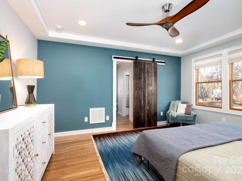 122 and 124 Shelburne Road, Asheville, NC 28806.  MLS# CAR4232938, YatesRealty ID 4604. Tray Ceiling, Sliding Barn Door, and Ensuite Full Bath