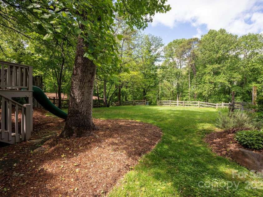 122 and 124 Shelburne Road, Asheville, NC 28806.  MLS# CAR4232938, YatesRealty ID 4604. Two-Acre Lot Adjoins Hominy Creek Greenway