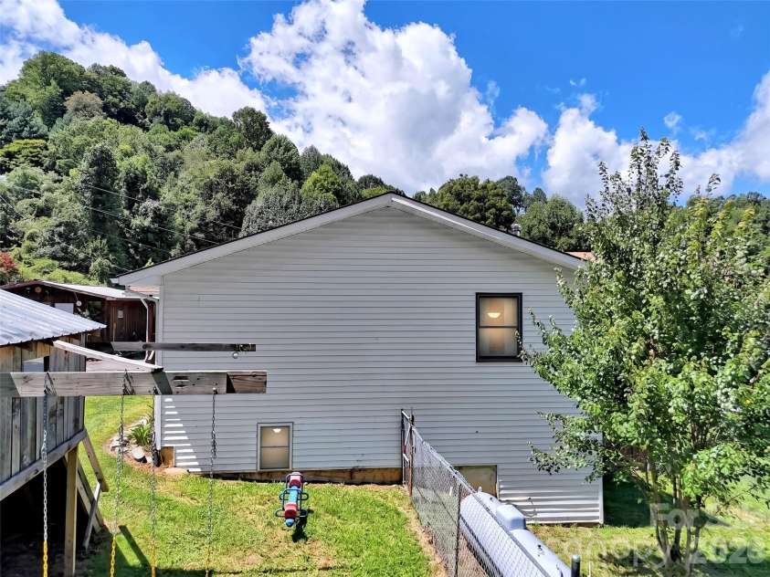 555 Acres View Drive, Waynesville, NC 28786.  MLS# CAR4417073, YatesRealty ID 46045. 