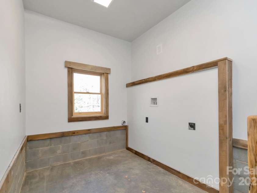 486 Hunter-Lysik Way, Laurel Springs, NC 28644.  MLS# CAR4325096, YatesRealty ID 4607. Laundry and Mud Room off Kitchen and Garage