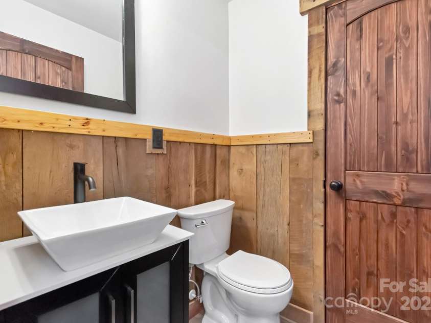 486 Hunter-Lysik Way, Laurel Springs, NC 28644.  MLS# CAR4325096, YatesRealty ID 4607. Main Level Guest Bathroom with Storage Closet