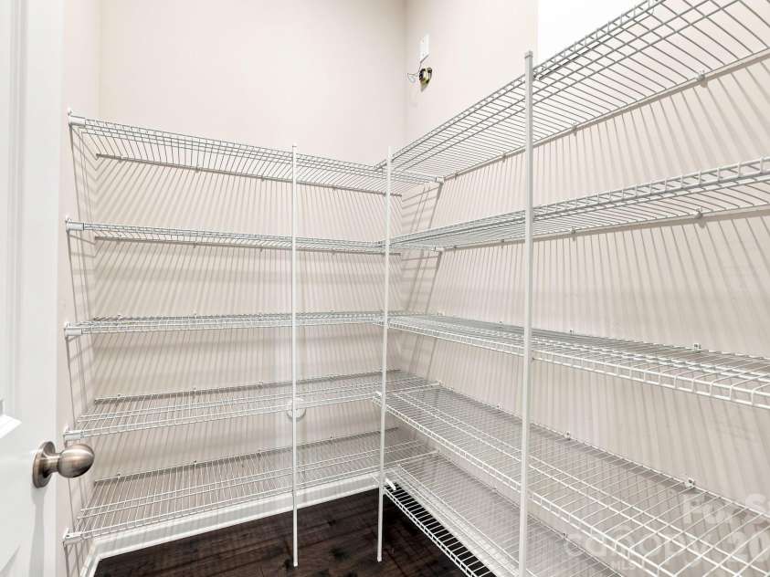 9604 Ainslie Downs Street, Charlotte, NC 28273.  MLS# CAR4416440, YatesRealty ID 46075. Pantry