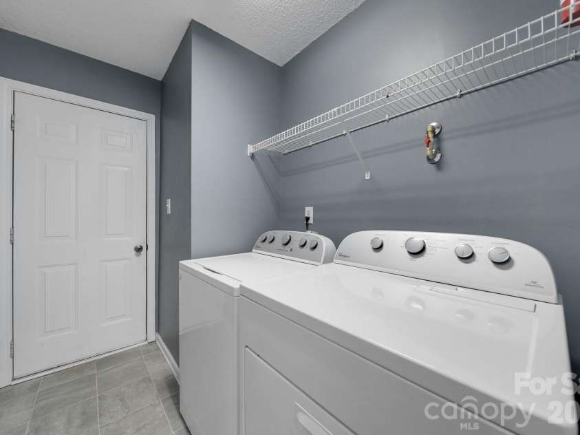 11343 Fox Hill Drive, Charlotte, NC 28269.  MLS# CAR4370223, YatesRealty ID 46081. Laundry Room