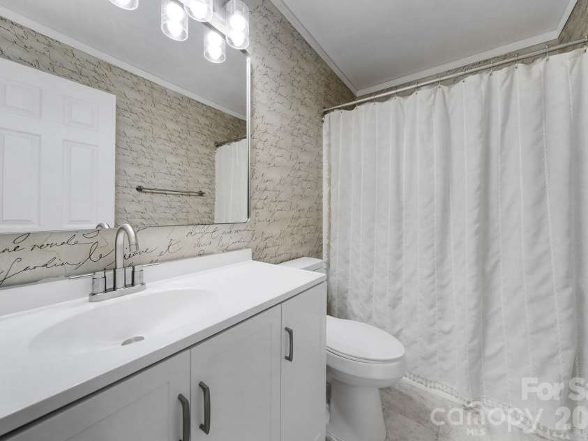 11343 Fox Hill Drive, Charlotte, NC 28269.  MLS# CAR4370223, YatesRealty ID 46081. Secondary Bathroom