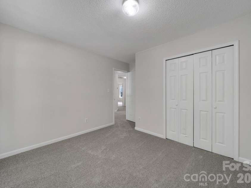 11343 Fox Hill Drive, Charlotte, NC 28269.  MLS# CAR4370223, YatesRealty ID 46081. Secondary Bedroom
