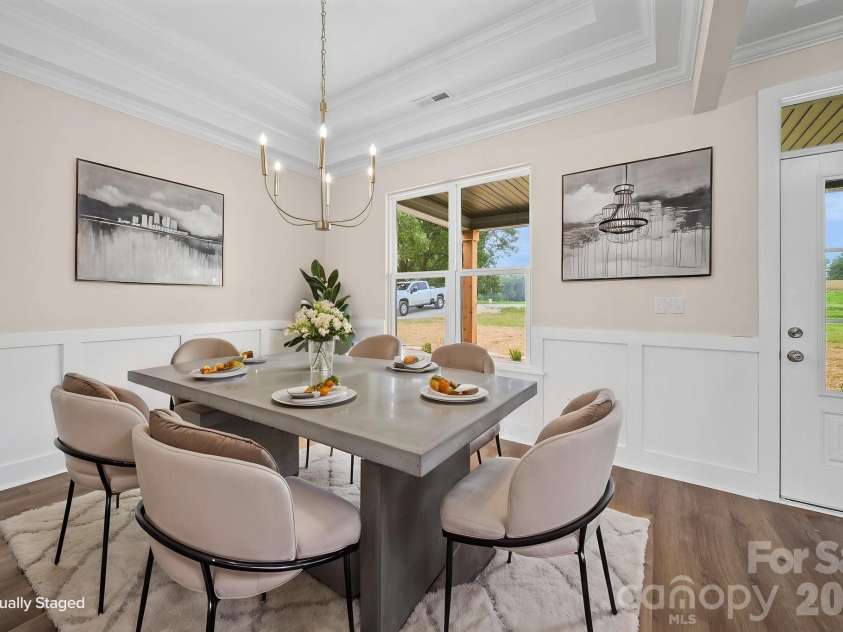 4515 Marvin Simpson Road, Marshville, NC 28103.  MLS# CAR4411738, YatesRealty ID 46083. Virtual Staged Formal Dining Area