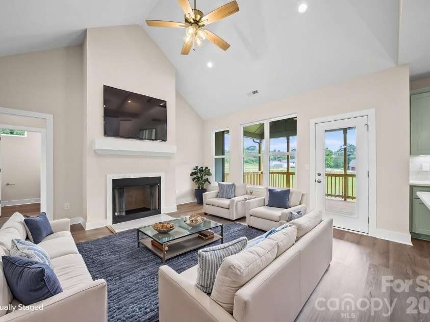 4515 Marvin Simpson Road, Marshville, NC 28103.  MLS# CAR4411738, YatesRealty ID 46083. Virtually staged great room.