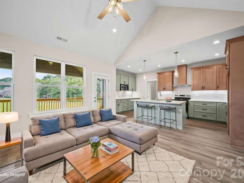 4515 Marvin Simpson Road, Marshville, NC 28103.  MLS# CAR4411738, YatesRealty ID 46083. Virtually Staged great room.