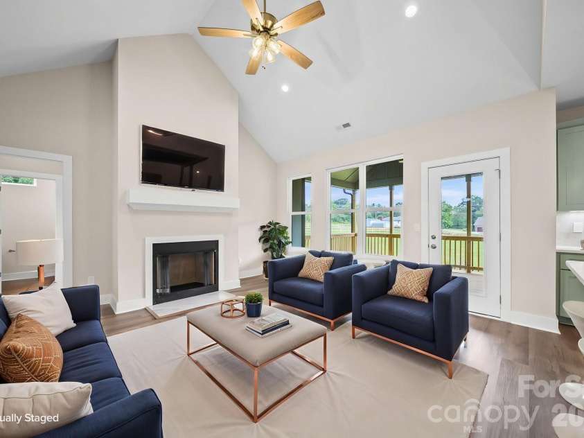 4515 Marvin Simpson Road, Marshville, NC 28103.  MLS# CAR4411738, YatesRealty ID 46083. Virtually staged great room.