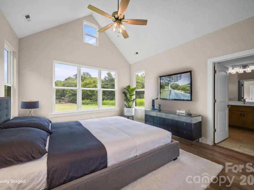 4515 Marvin Simpson Road, Marshville, NC 28103.  MLS# CAR4411738, YatesRealty ID 46083. Virtually staged primary bedroom.