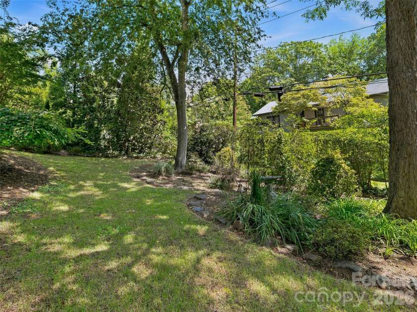 53 Lyncourt Drive, Tryon, NC 28782.  MLS# CAR4417134, YatesRealty ID 46084. Backyard