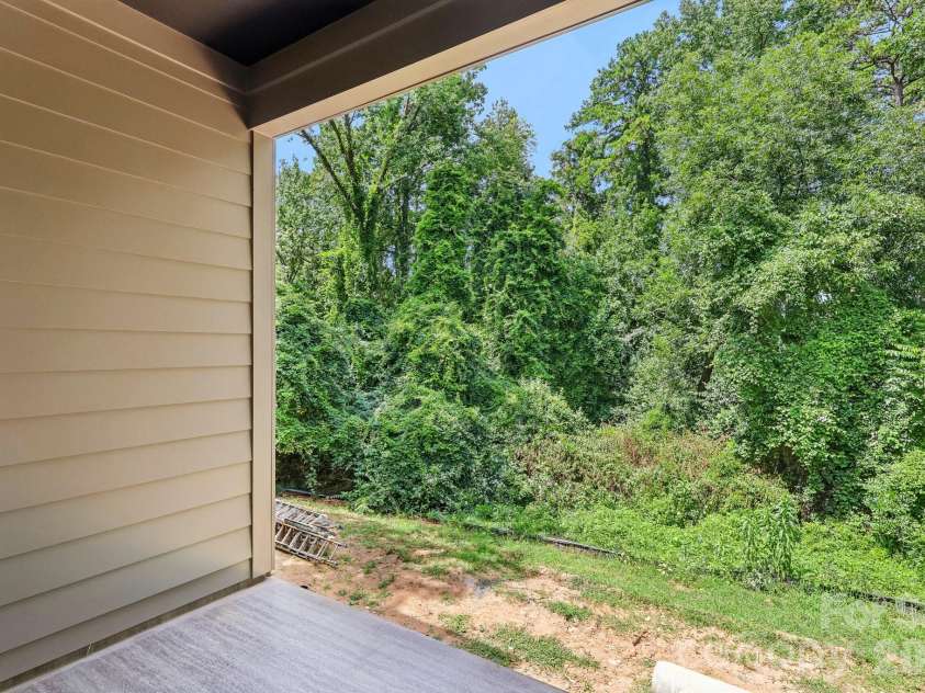 1539 Crystal Road, Charlotte, NC 28205.  MLS# CAR4356232, YatesRealty ID 46094. Covered balcony 2nd level - Representative Photo Only
