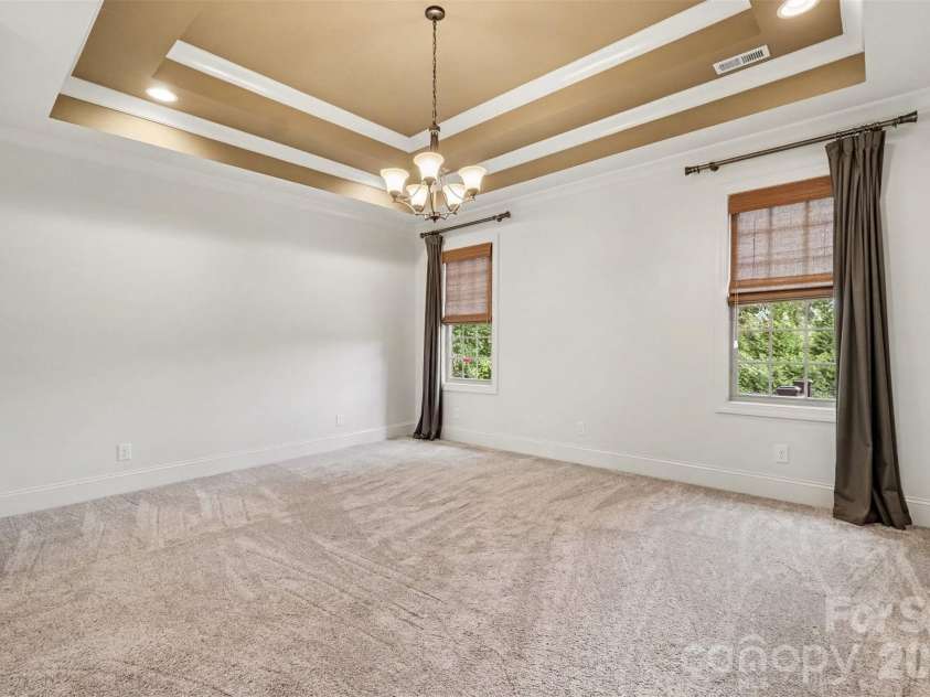 503 Williamsfield Drive, Shelby, NC 28150.  MLS# CAR4413395, YatesRealty ID 46095. The primary bedroom is spacious with a tray ceiling...