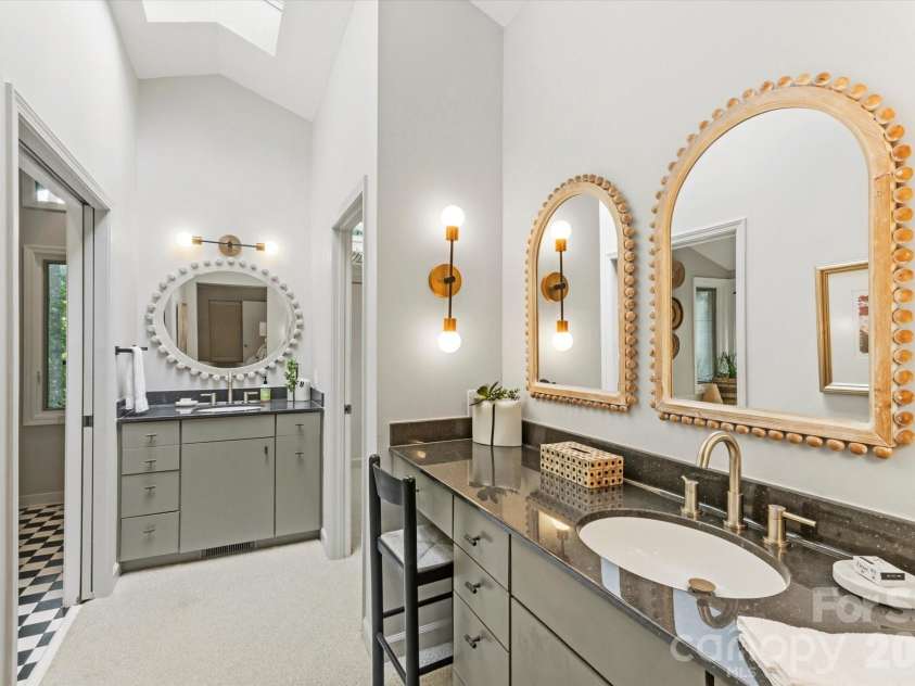 651 Glen Cannon Drive, Pisgah Forest, NC 28768.  MLS# CAR4414802, YatesRealty ID 46098. Light filled primary bath