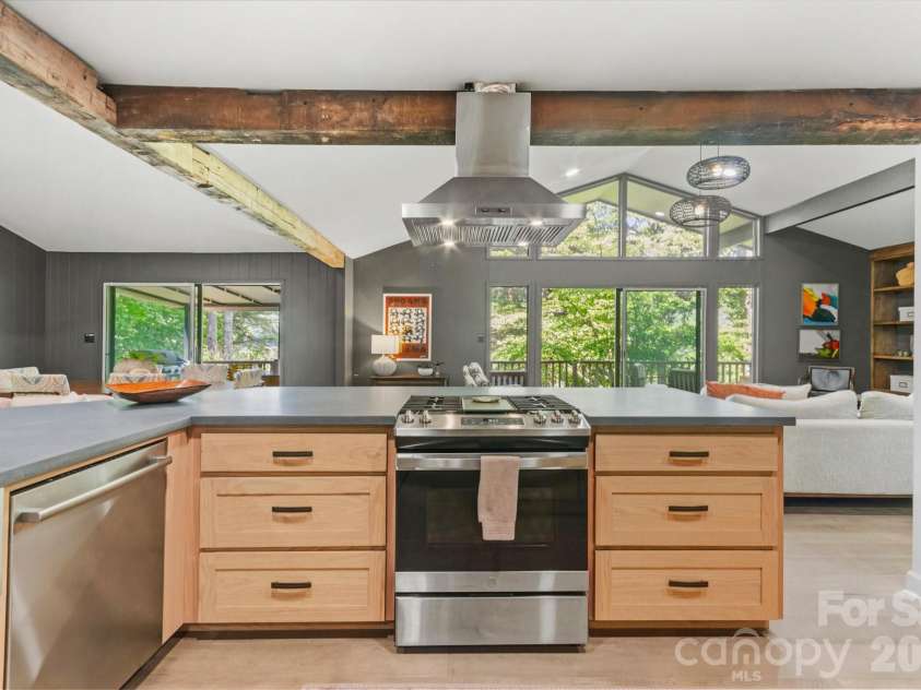 651 Glen Cannon Drive, Pisgah Forest, NC 28768.  MLS# CAR4414802, YatesRealty ID 46098. Rustic beams and views all add to this delightful kitchen