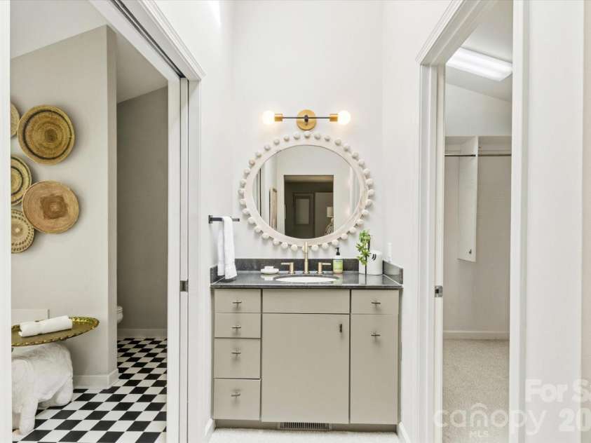 651 Glen Cannon Drive, Pisgah Forest, NC 28768.  MLS# CAR4414802, YatesRealty ID 46098. Second sink in primary bath