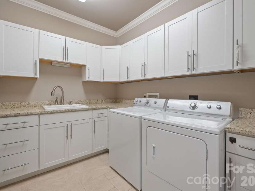 121 Cheyenne Lane, Statesville, NC 28677.  MLS# CAR4412107, YatesRealty ID 46100. Oversized laundry on Main